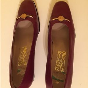 Cranberry Ferragamo pumps.